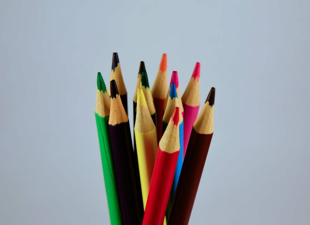 Different color wooden pencils on white background. - Fotó, kép