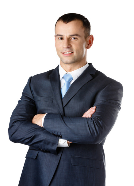 Portrait of businessman with arms crossed - Photo, Image