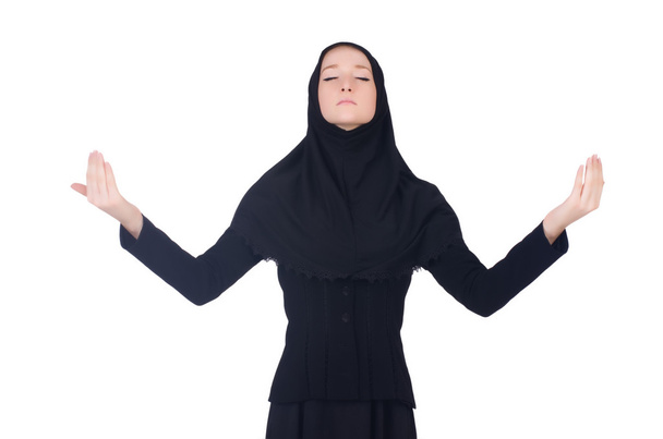 Giovane donna musulmana che prega isolata sul bianco - Foto, immagini