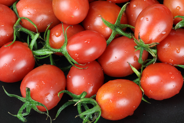 Small cherry tomato background close up - Fotoğraf, Görsel