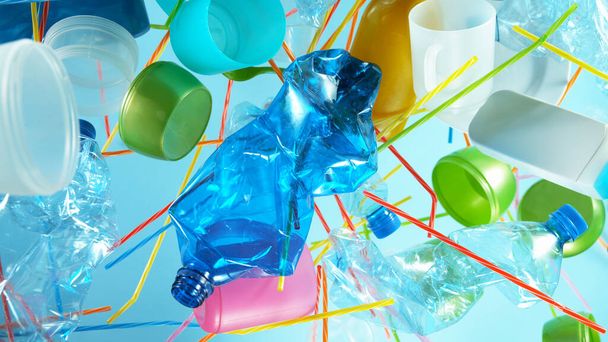 Pile of flying empty plastic waste, concept of plastical pollution. - Fotoğraf, Görsel