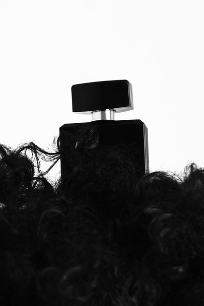 Man black fragrance bottle of perfume isolated on white - Foto, immagini