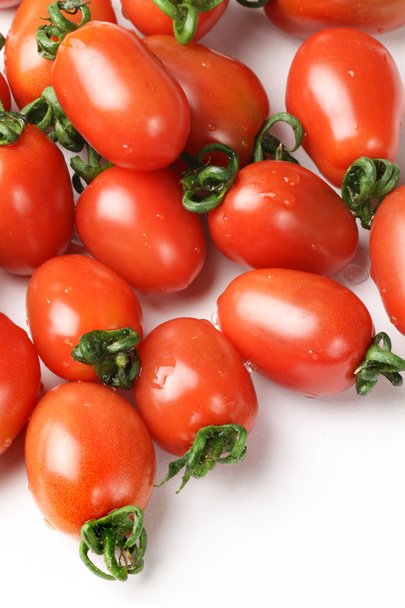 Small cherry tomato on white background close up - Foto, Imagen
