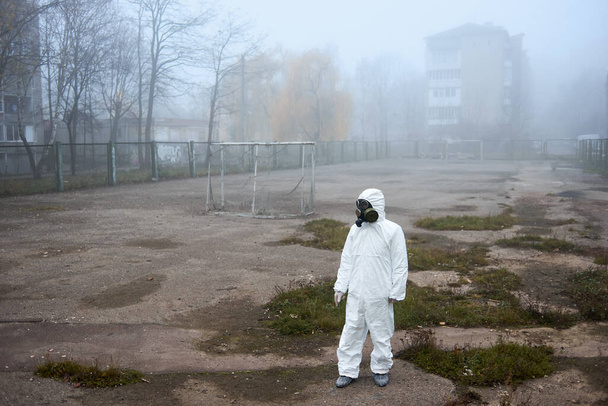 Scientist standing on abandoned street sports ground.  - Photo, Image