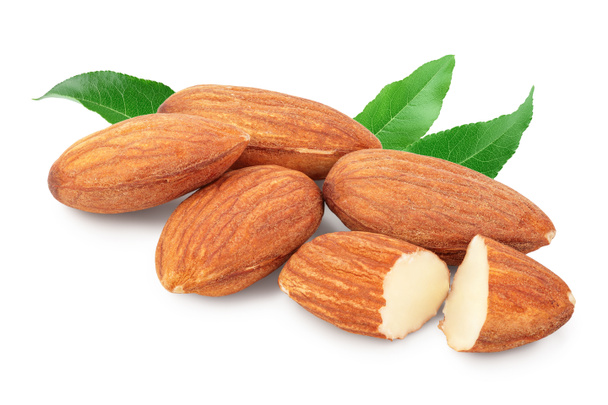 Almonds nuts with leaf isolated on white background with clipping path and full depth of field. - Photo, Image