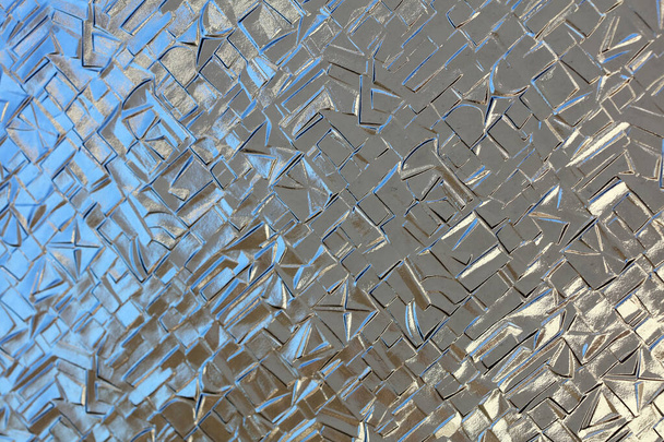 Ablaküveg kockákkal és háromszögekkel díszített háttér kiváló minőségű - Fotó, kép