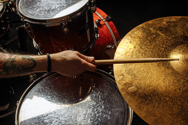 unrecognizable drummer playing on drum - Foto, Imagem