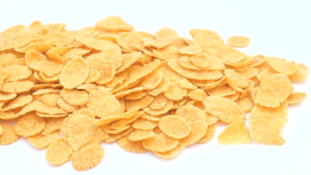 eine Streuung von Cornflakes auf weißem Hintergrund - Filmmaterial, Video