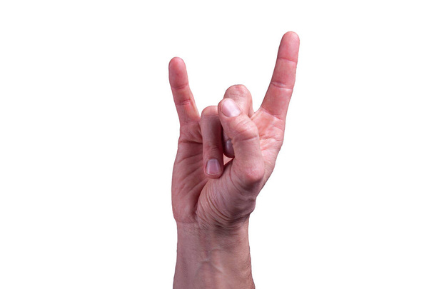 Kaukázusi emberi kéz mutatja A jel a szarvak izolált fehér háttér - Fotó, kép