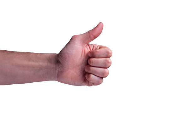 Beyaz insan eli, genellikle izole edilmiş beyaz arka planda baş parmak işareti olarak tanımlanan başparmak sinyali gösterir. - Fotoğraf, Görsel