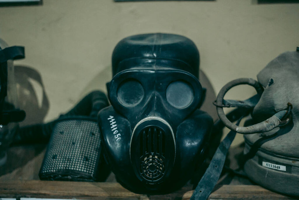 Old Soviet gas masks against radiation that were used during the liquidation of the Chernobyl accident - Zdjęcie, obraz