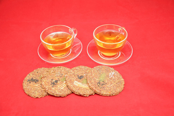 Two cups of green tea on a red background - Photo, Image