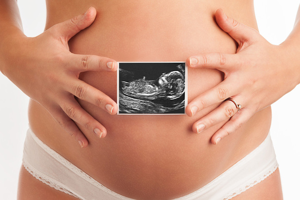 Pregnant Ladys Tummy with Baby Scan. - Photo, Image