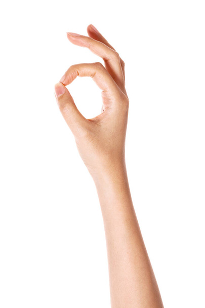 Kadın el hareketi (tamam, evet, grest) beyaz üzerine izole. - Fotoğraf, Görsel