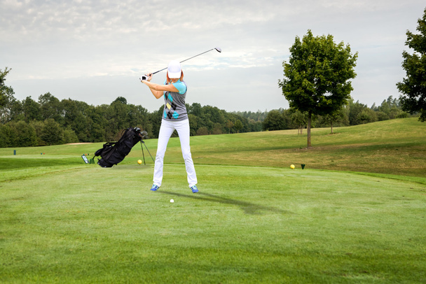 Golfin pelaaminen
 - Valokuva, kuva