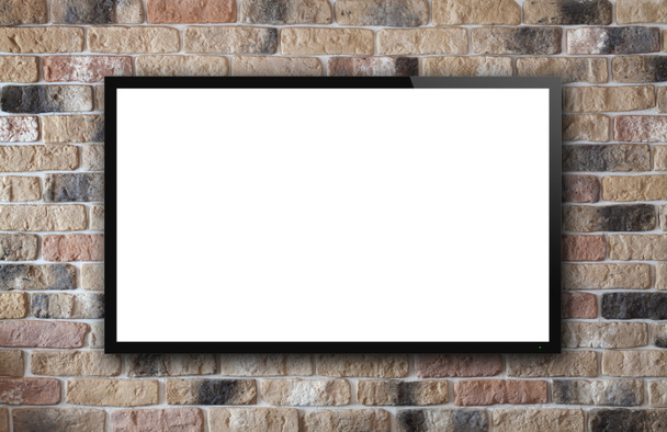 οθόνη της τηλεόρασης στον τοίχο από τούβλα - Φωτογραφία, εικόνα