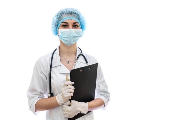 Doctor escribiendo en portapapeles aislado en blanco
 - Foto, Imagen