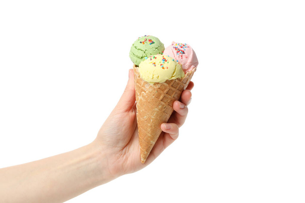 Female hand holds ice cream, isolated on white background - Fotó, kép
