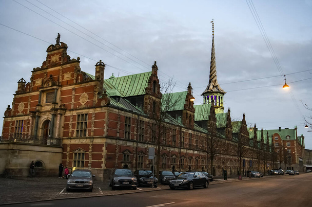 View to Borsen, building of Copenhagen Stock Exchange on the island of Slotsholmen. Copenhagen, Denmark.  - Фото, изображение