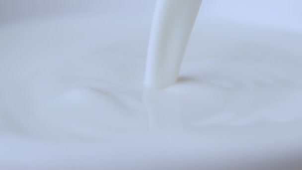 Close-up milky liquid being poured. Slow Motion. - Footage, Video