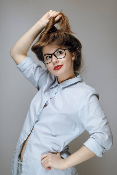 stressed crazy Businesswoman in glasses on grey background - Φωτογραφία, εικόνα