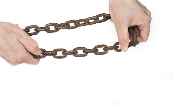 Chain in a woman hands on a white - Photo, Image