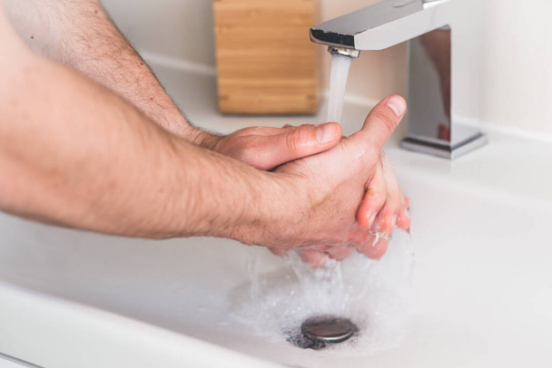 Hand washing with soap in bathroom to prevent contaminate, close up - Φωτογραφία, εικόνα