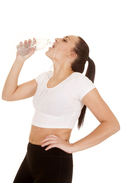woman fitness outfit drink water splash - Foto, Imagem