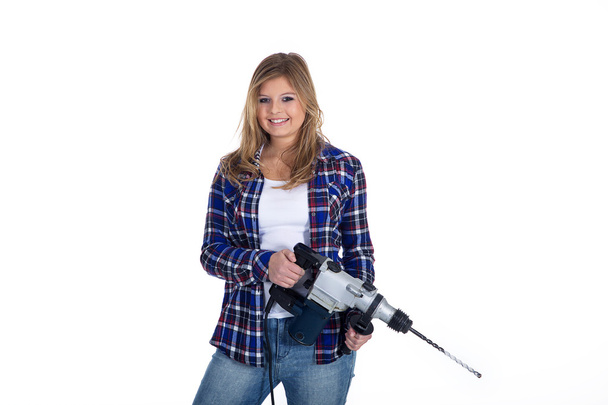 Blonde girl with drill - Photo, image