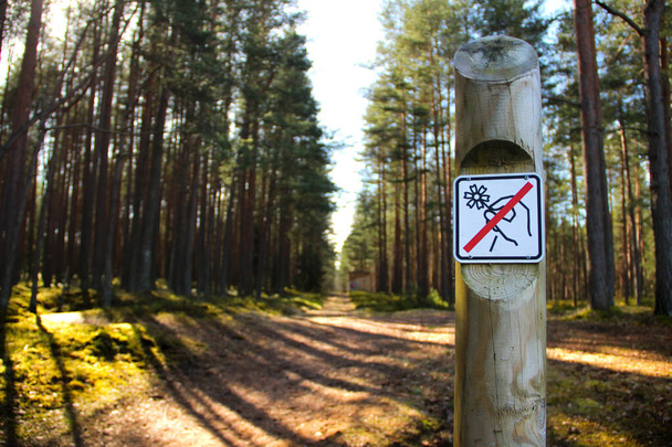 Taking a walk in the  nature park of Ogre, Latvia. Forbidding sign entering the parkland.  - Photo, Image