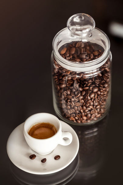 Jar of coffee and cup of espresso - Foto, afbeelding