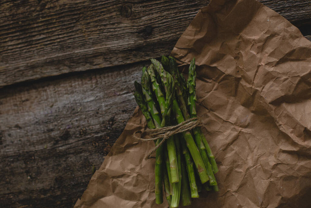 Food. Asparagus on a wooden table - 写真・画像