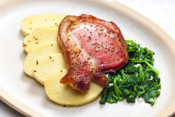 smoke meat with spinach and potato dumplings - Photo, Image