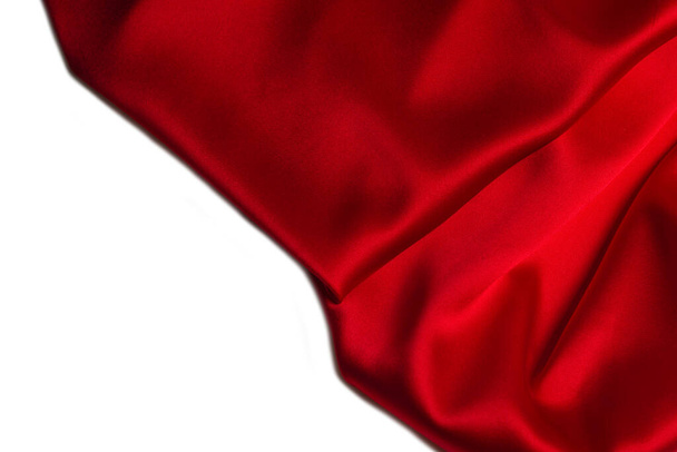 Červené hedvábí nebo saténový luxusní textura tkaniny lze použít jako abstraktní pozadí. Horní pohled. - Fotografie, Obrázek