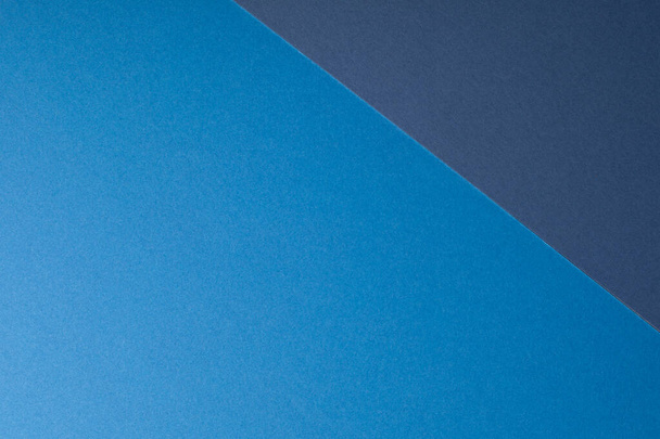 Donker en lichtblauw pastel kleur papier geometrische platte lay achtergrond. - Foto, afbeelding