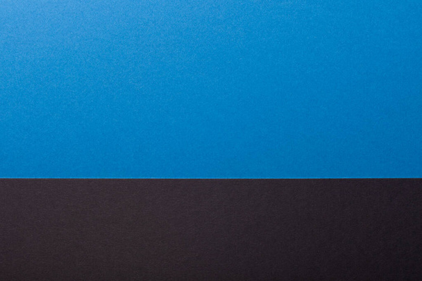 Black and blue color paper background, texture, copy space. - Foto, afbeelding