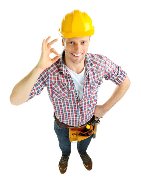 Portrait of young builder isolated on white - Фото, зображення