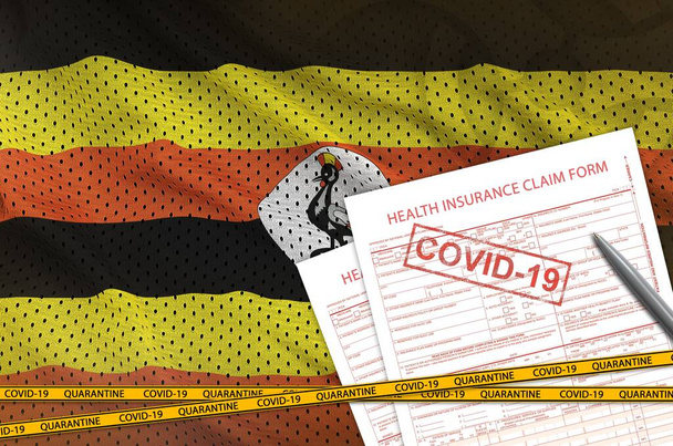 Oeganda vlag en ziektekostenverzekering aanvraagformulier met covid-19 stempel. Coronavirus of pandemisch concept 2019-nCov-virus - Foto, afbeelding