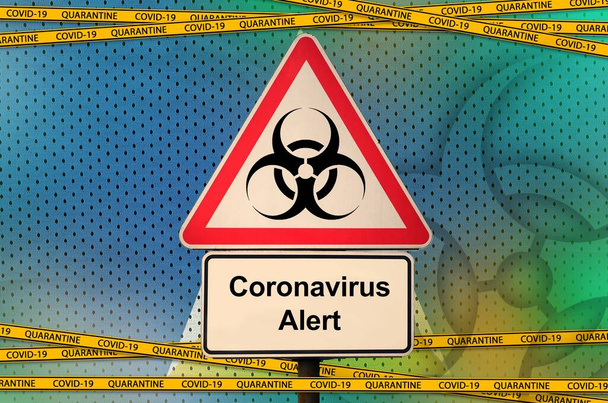 Saint-Lucia-Flagge und Covid-19 Biohazard-Symbol mit orangefarbenem Quarantäneband. Coronavirus oder Pandemiekonzept 2019-nCov - Foto, Bild