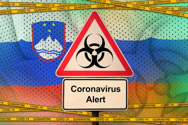 Szlovénia zászló és Covid-19 biológiai veszély szimbólum karantén narancssárga szalaggal. Coronavirus vagy pandémia 2019-nCov vírus koncepció - Fotó, kép