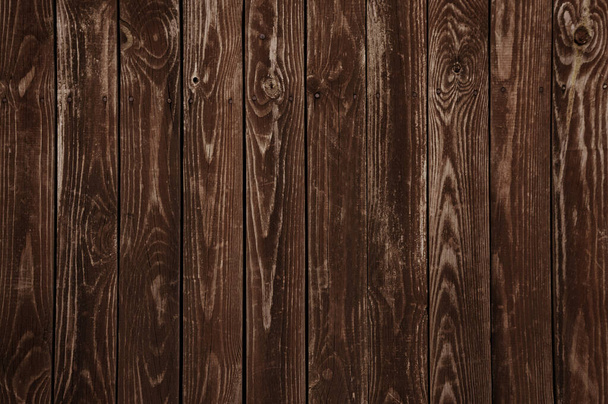 Old dark brown wooden wall background texture close up - Photo, image