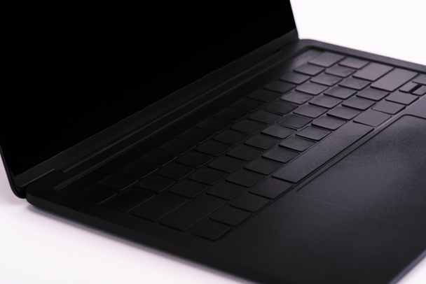 modern and black laptop with blank screen on white  - Foto, Bild