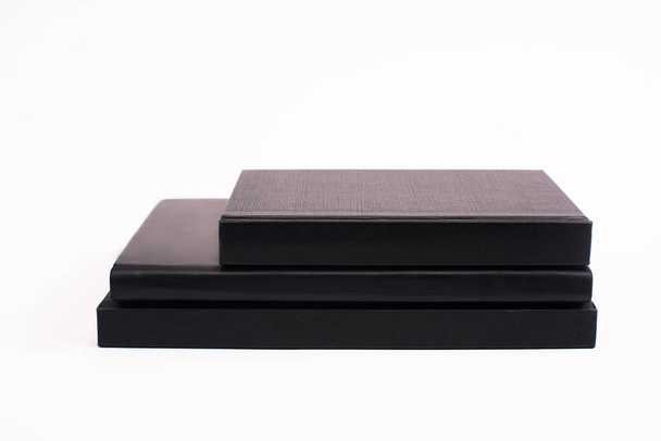 black notepads isolated on white with copy space  - Zdjęcie, obraz