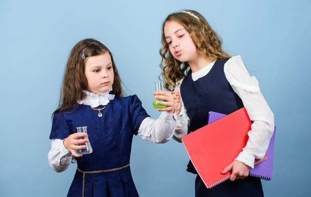 children study chemistry lab. school kid scientist studying science. back to school. curious girls with folder. curious about results. little smart girls with testing flask. biology education - Foto, Imagem