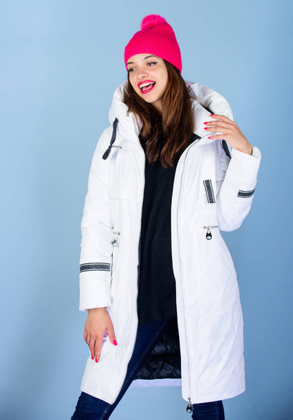 Christmas atmosphere around. woman in padded warm coat. beauty in winter clothing. cold season shopping. happy winter holidays. girl in beanie hat. faux fur fashion. flu and cold. seasonal fashion - Foto, afbeelding