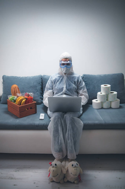 Quarantine and isolation during the virus outbreak - groceries and food in stock, working from home over the internet. - Foto, imagen