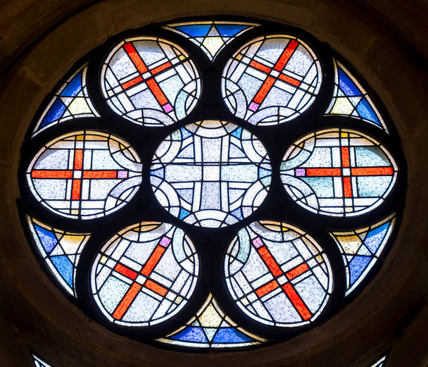Clolourfull round stained glass in a Cathedral of St. Peter, Trier, Germany - Photo, Image