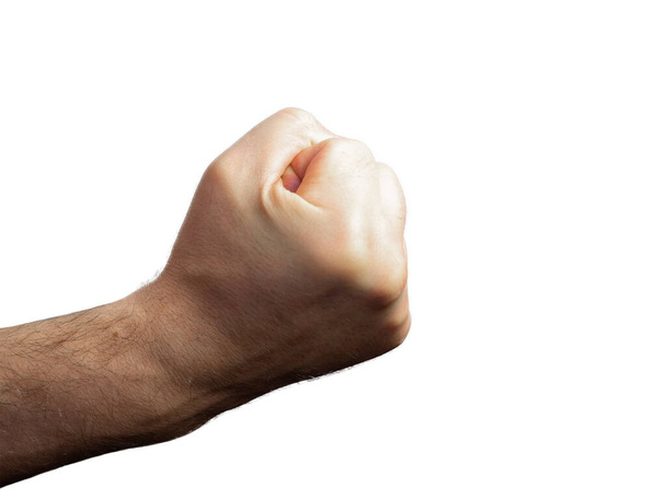 man brutale harige hand gebald in een vuist op een geïsoleerde achtergrond - Foto, afbeelding