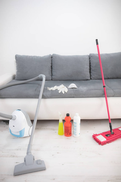 Home, apartment and room sterilization / decontamination, cleaning, vacuuming with vacuum cleaner and chemicals in the time of dangerous viruses. - Foto, immagini