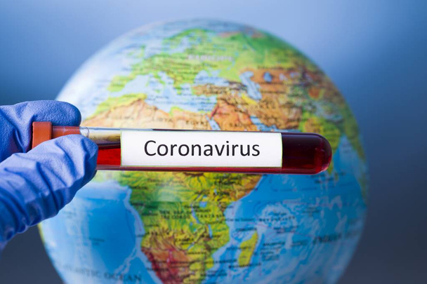 Coronavirus. Covid-19. Coronavirus Pandemic. Coronavirus2019. Earth with text concerning the Coronavirus Pandemic. - Foto, Bild
